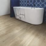 Quickstep-Impressive van Quickstep in de kleur Zacht-Eik-Lichtbruin - PVC vloeren